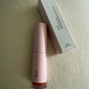 Glossier suit soft, touch, lip cream. Color- STRIKE